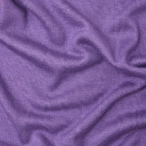 Tela de Punto Soft Lima Knit de meetMILK en un delicado color malva, dispuesta en pliegues suaves para mostrar su textura elegante y caída pesada.