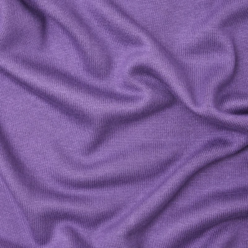 Tela de Punto Soft Lima Knit de meetMILK en un delicado color malva, dispuesta en pliegues suaves para mostrar su textura elegante y caída pesada.