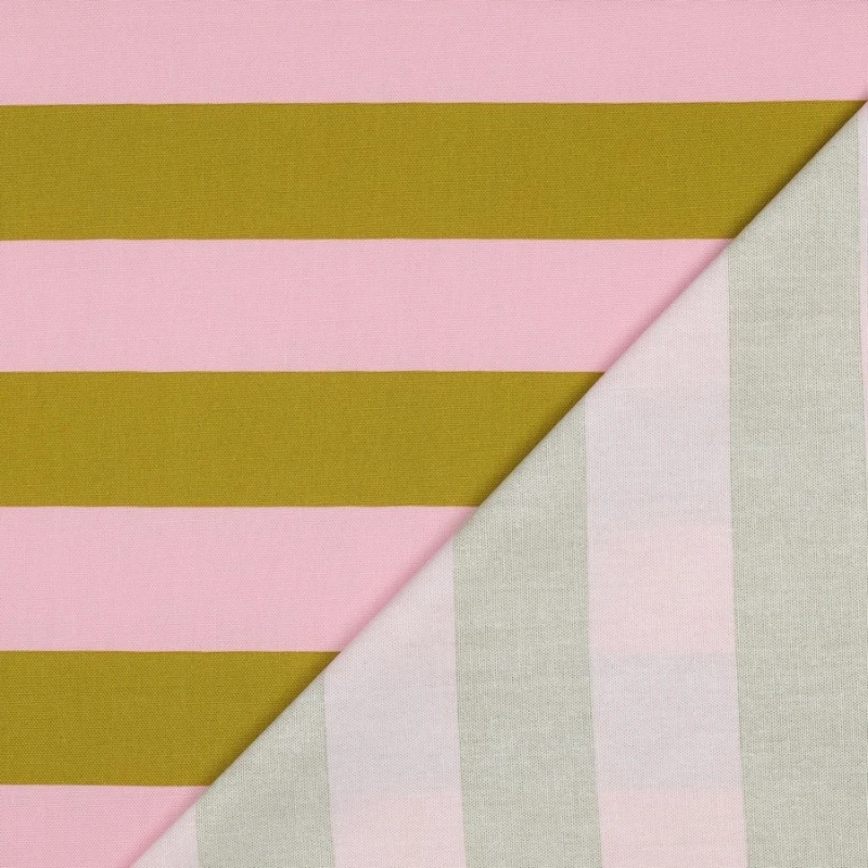 Primer plano del tejido canvas mostrando su característica textura de ligamento Panamá y el detalle de las rayas rosa y ocre.